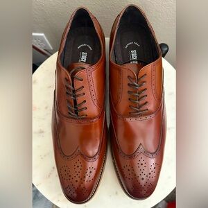 NWOT  Men's Dunbar Wing Tip Oxford Size 14

Cognac Leather